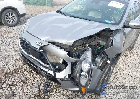 2020 Kia Sportage Ex z USA, uszkodzony, nr VIN KNDPNCAC9L7637992